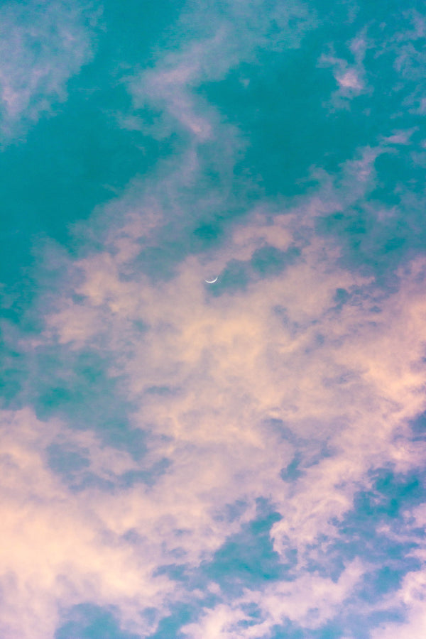 Teal purple sky with flossy clouds for Zodiaque Moon monthly horoscopes