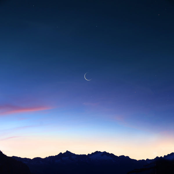 New moon in blue night sky for Zodiaque Moon monthly horoscopes