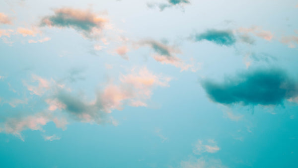 Pink and blue clouds for Zodiaque Moon monthly horoscopes